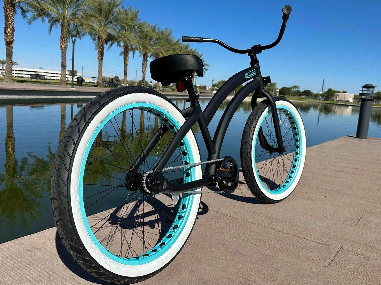 Damen SIKK Breitreifen Singlespeed-Rad Schwarz Rahmen Türkis Räder Weißwandreifen Ein Traum